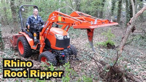 Tree stump removal with a Kubota B2261 Compact Tractor using 